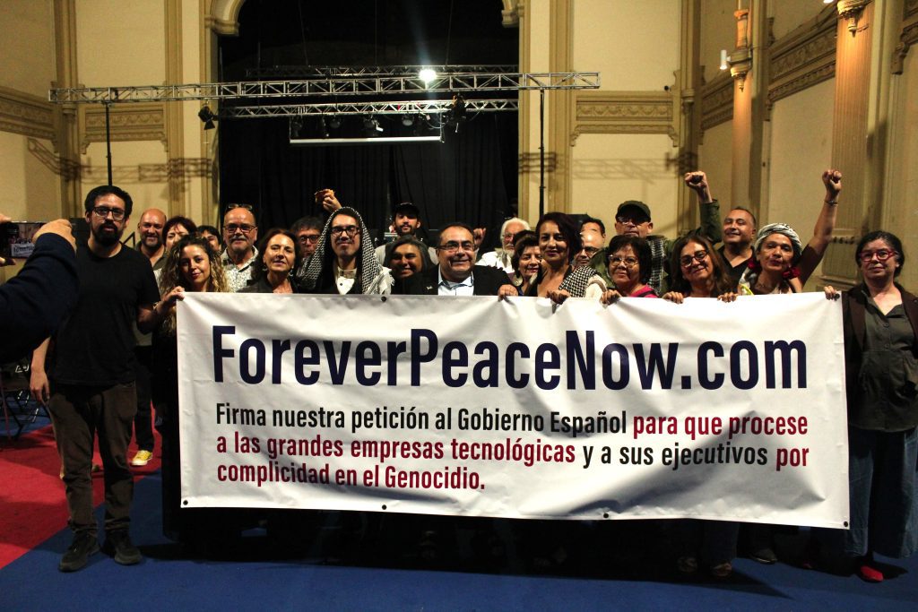 people standing with foreverpeacenow.com banner